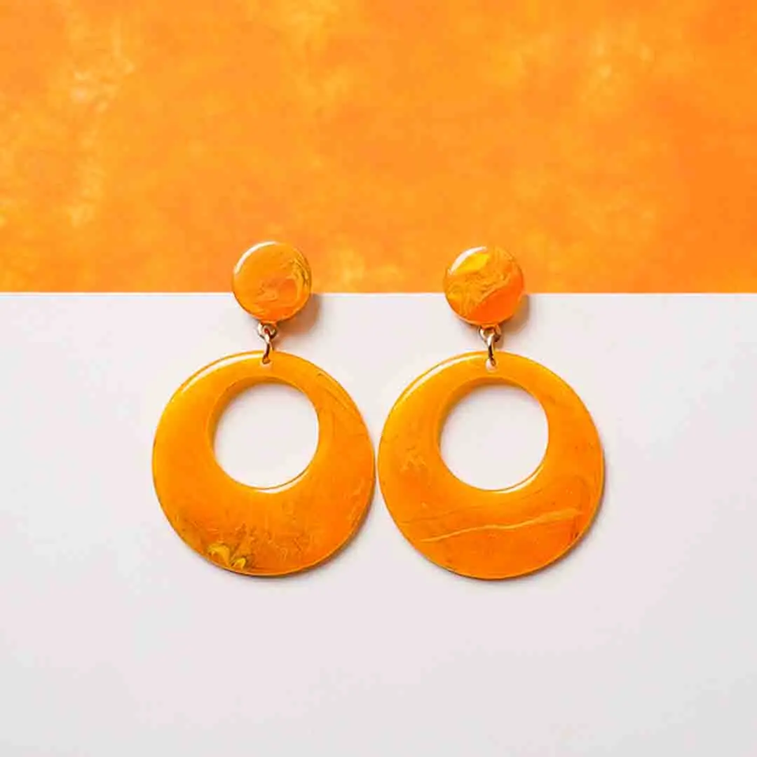 108-Th Chic metal hoop earrings featuring a wooden beads and a latch back for easy wear.