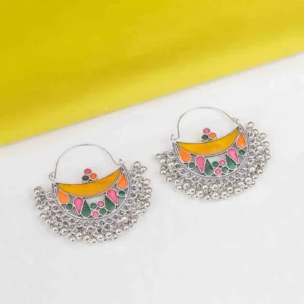Stylish geometric metal dangle earrings with a silver finish along with colorful enamel detailing, delicate chain tassels with circular beads, and a push-back closure