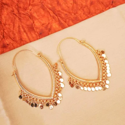 Elegant inverted V-shaped drop earrings crafted from textured metal in an antique gold-tone finish, featuring small dangling circular discs and a secure hinged back closure.