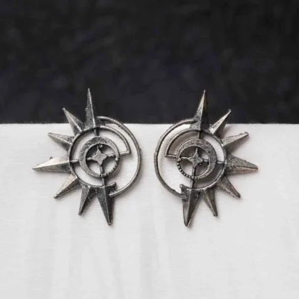 Intricately crafted oxidized C-hoop earring with floral detailing, offering a vintage charm, and finished with a push-back closure.