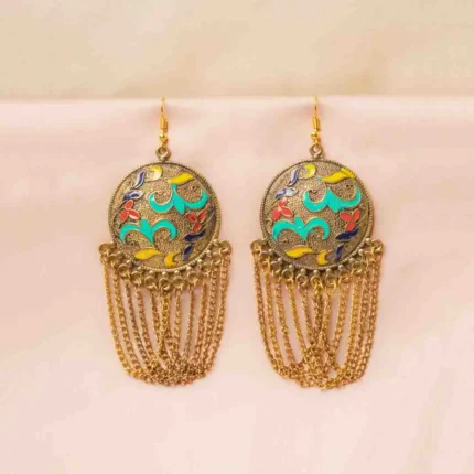 Handcrafted metal dangle earrings featuring a floral detailing and oxidised gold-tone finish designed with interconnected chain tassels secured with a curved hook closure.