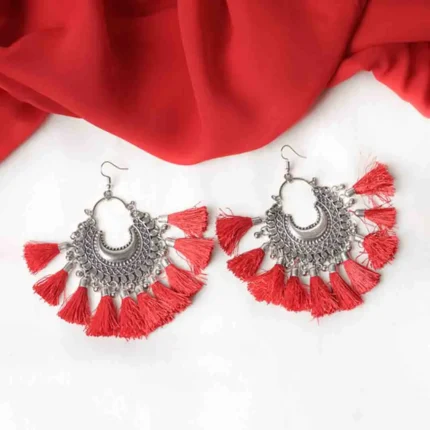 Craftsmanship oxidized silver crescent dangle earring featuring symmetrical geometric detailing, dangling circular beads, and colorful tassel highlights