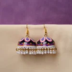 Fusion-style silver-tone jhumka earring featuring intricate floral meenakari artwork, a dome-shaped silhouette, and circular pearl bead embellishments.