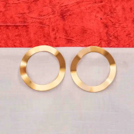 Minimalist brass earrings with an irregular design, subtle texture detailing, and a classic push-back closure