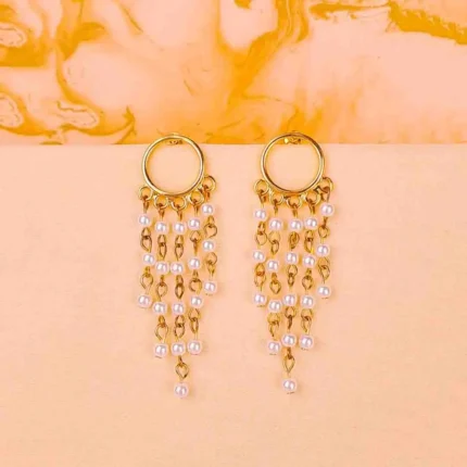 Sleek and contemporary dangle earrings with a coiled spiral structure, finished in a silver tone and secured with a push-back post.