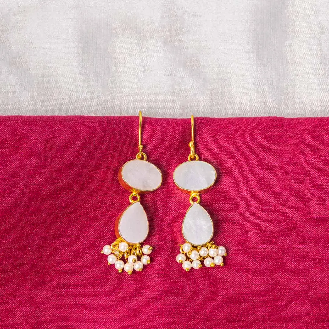 145-1 (1) Chic teardrop-shaped metal drop earrings with a gold/moss green finish, showcasing a raw gemstone in an earthy gray and brown mix with a soft shimmer, and a curved hook closure