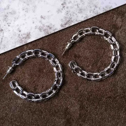 Trendy mini C-hoop chunky earring with a polished gold-tone/silver finish, adorned several interconnected oval links , push-back post.