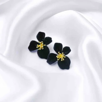 Delicate flower stud earring with a gold-tone finish, red roses and green leaves gemstone textured golden center, and a hinged back.