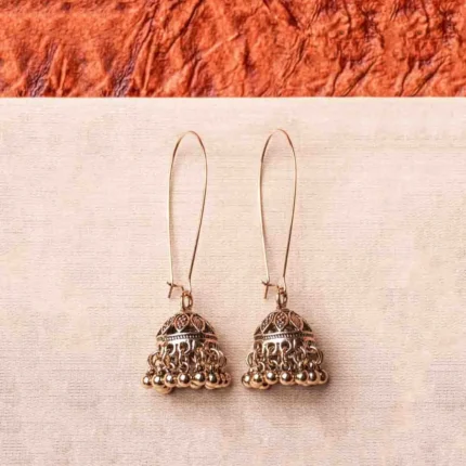Lovely antique-finish metal chain jhumka earrings with a floral design, delicate dangling metallic beads, a classic dome-shaped design, and a push-back closure