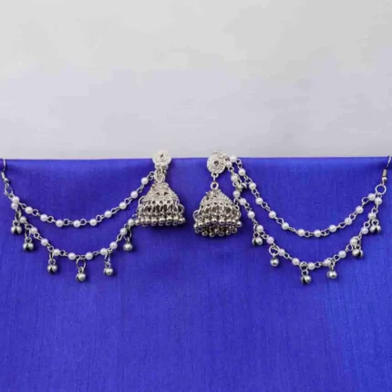 Antique-style silver-tone jhumka ear hair chain earring featuring teadrop top, triangular jhumkas having chain tassel detailed with pearl beads and a delicate chain with circular line charms, finished with a push-back closure, with ghungroos at the end with a curved hook closure.