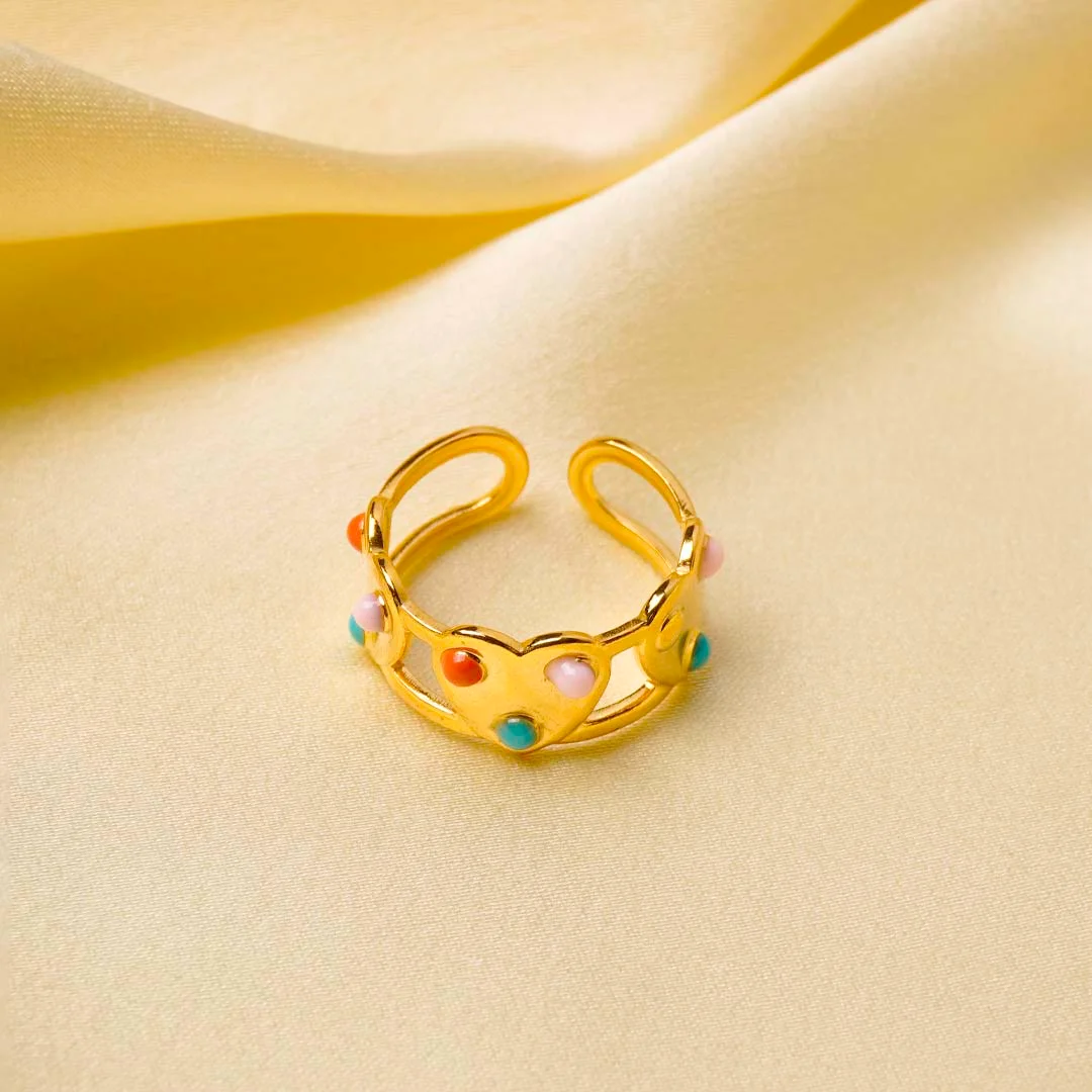457-Th Stylish gold-tone adjustable ring featuring heart motifs, each set with dazzling colorful gemstones