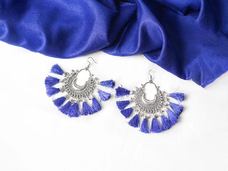 Elegant flatlay of oxidised jewelry including layered necklaces, jhumkas, bangles, and rings styled with ethnic and Western outfits – perfect for every occasion 17