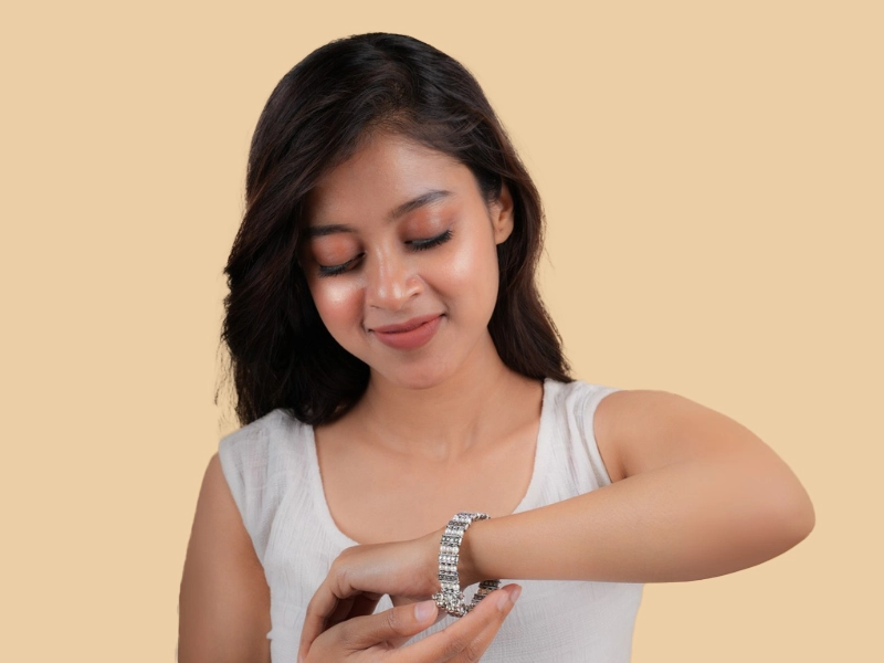 Elegant flatlay of oxidised jewelry including layered necklaces, jhumkas, bangles, and rings styled with ethnic and Western outfits – perfect for every occasion 9