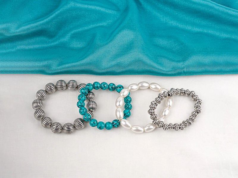 Elegant flatlay of oxidised jewelry including layered necklaces, jhumkas, bangles, and rings styled with ethnic and Western outfits – perfect for every occasion 4