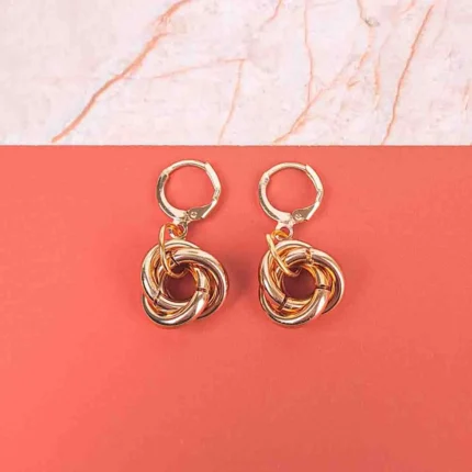  Drop earrings with interlocking metal knots and secure hoop clasp, on jewelry card.