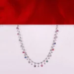 Delicate necklace with colorful butterfly charms on a fine chain, perfect for layering or everyday wear