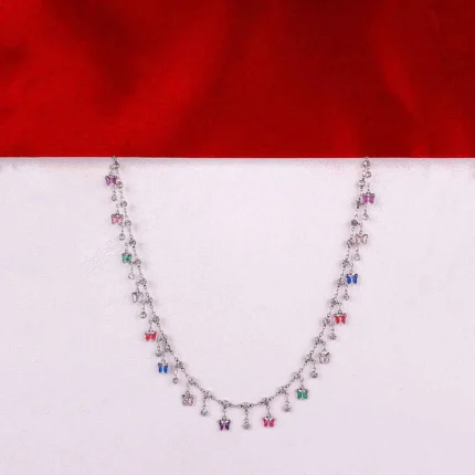 Delicate necklace with colorful butterfly charms on a fine chain, perfect for layering or everyday wear