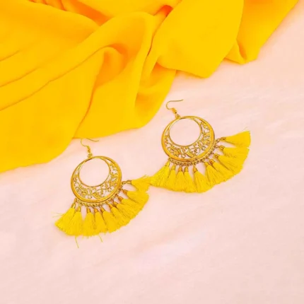 Gold hoop earrings with intricate filigree tassel drops.