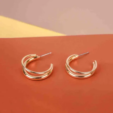 Trendy mini C-hoop earring with a polished silver-tone, golden tone/crimson red finish featuring dangling reddish stone chip beads at the bottom and , push-back post.