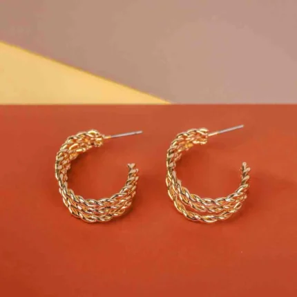 Trendy mini C-hoop earring with a polished silver-tone, golden tone/crimson red finish featuring dangling reddish stone chip beads at the bottom and , push-back post.