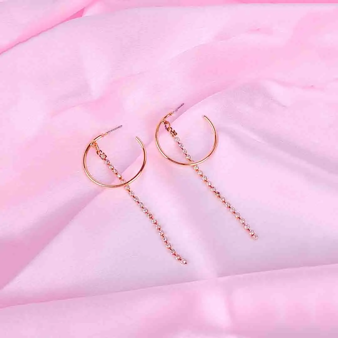 20251106_114940 Gold hoop earrings with rhinestone chain drops, featuring polished half hoops and cascading crystals.