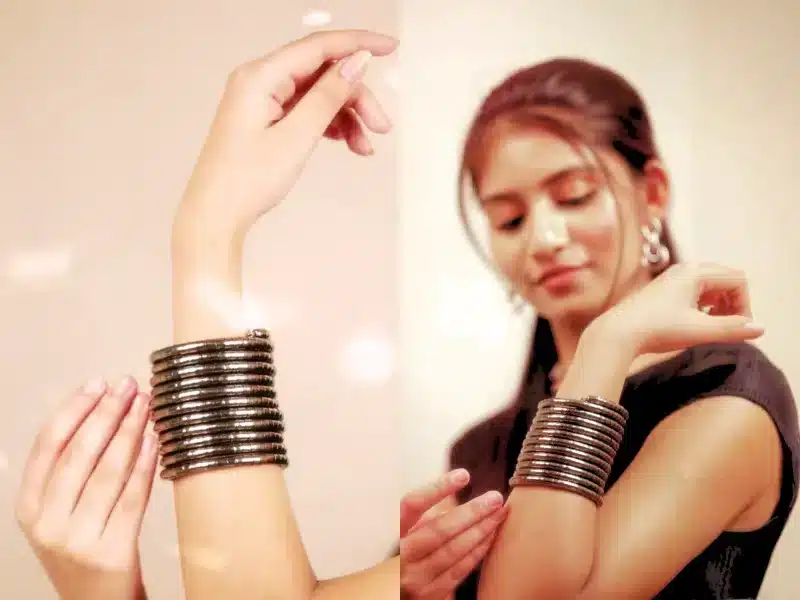 Spiral bracelets styled with casual denim and a white t-shirt